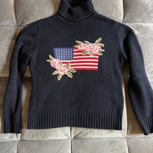 Casual Corner Black Turtleneck Sweater with Floral Flag Design
